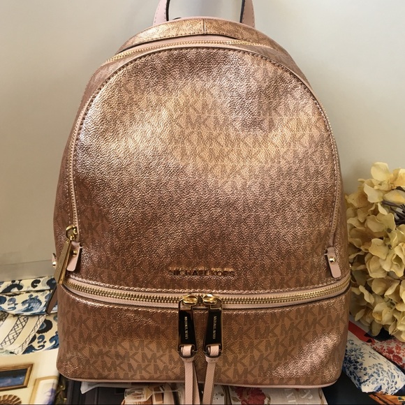 michael kors metallic rose gold backpack